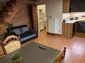Obývací pokoj s kuchyní - menší část domu